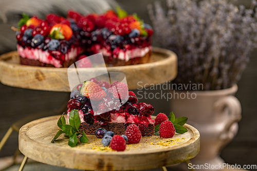 Image of Chocolate cake with berries on top