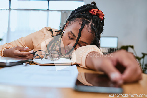 Image of Black woman, tired and sleeping in home office with a book while studying or working with fatigue. Entrepreneur person tired, burnout and exhausted with remote work and startup business stress