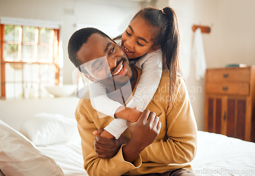 Image of Family, child hug father with love and care at home, happiness with relationship, trust and affection. Black man, young girl smile and happy people with embrace, wellness with bonding together