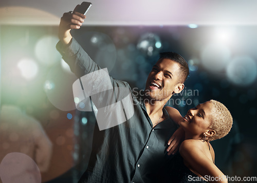 Image of Couple of friends, phone or selfie on party dance floor in nightclub event, bokeh disco or birthday celebration. Smile, happy or bonding people on mobile photography, social media or profile picture