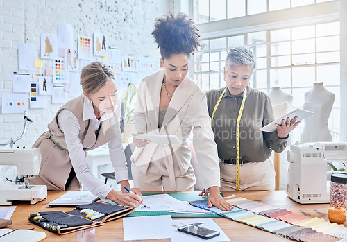 Image of Planning, fashion and designer with business people in workshop studio for manufacturing, fabric and idea. Tailor, boutique and retail with women and swatch for ecommerce, small business and industry