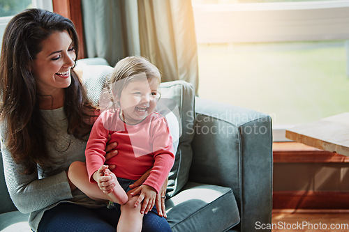 Image of Relax, happy and smile with mother and baby on sofa for bonding, quality time and child development. Growth, support and trust with mom and daughter in family home for health, connection and care