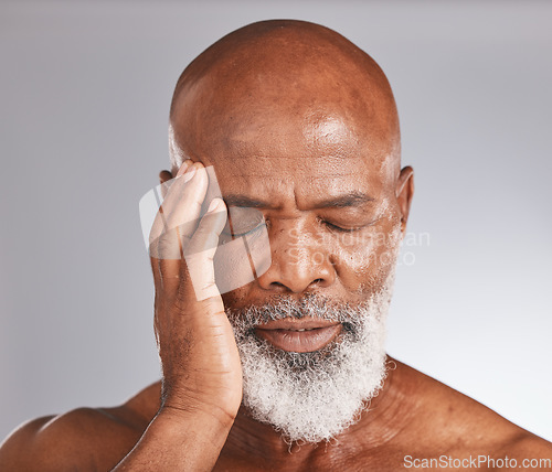 Image of Elderly black man, headache and pain with stress and mental health against studio background. Depression, skin and senior man face with healthcare problem, retirement and anxiety with migraine