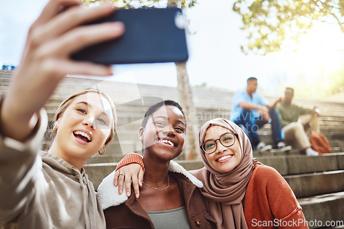 Image of Students, diversity or phone selfie on college campus bleachers, university stairs of school steps for social media or profile picture. Smile, happy women or bonding on mobile photography technology