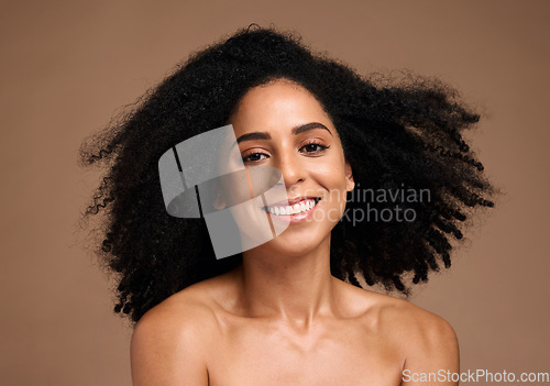 Image of African woman, smile and portrait for skincare beauty wellness, happiness and facial glow or natural afro hair care in brown background studio. Black model, smile and luxury cosmetics dermatology