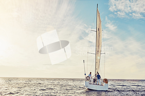 Image of Couple sailing on yacht, adventure and travel with nature, luxury vacation on the ocean for summer holiday. Wealthy people out at sea, lifestyle with blue sky, romantic getaway with seascape mockup