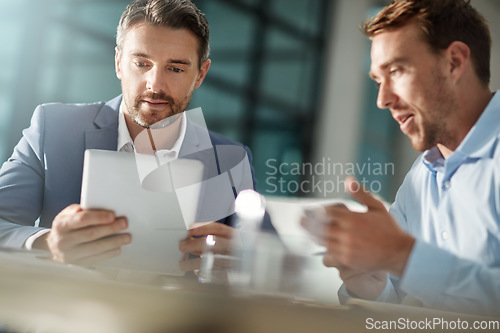 Image of Teamwork, tablet and business people in office talking, brainstorming or discussion. Collaboration, technology and men or employees with touchscreen planning sales, marketing or advertising strategy.