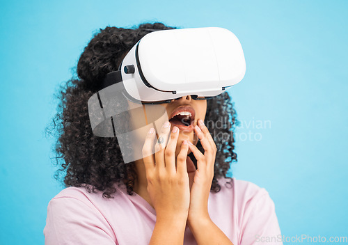 Image of Black woman with virtual reality glasses, surprise and wow, VR and metaverse, futuristic tech isolated on blue background. Gaming, web and augmented reality, ux in studio and future technology mockup