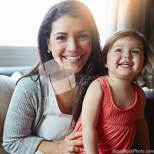 Image of Mother, child and happy portrait together on sofa in living room for relax love bonding, fun and support care. Mom smile, excited little daughter and quality time happiness on couch in family home