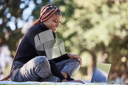 Image of Black woman, laptop and relax outdoor picnic for college studying, happy learning and digital education. Nature park, young African girl smile and reading university communication online in sunshine