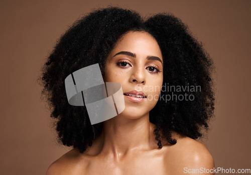 Image of Face portrait, beauty skincare and black woman in studio isolated on a brown background. Cosmetics, makeup and young female model with glowing, healthy and flawless skin after spa facial treatment.