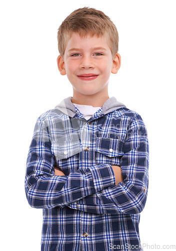 Image of Arms crossed, smile and portrait of a child with pride isolated on a studio background. Happy, fashion and stylish boy model with confidence, happiness and young on a white background in studio