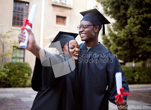 Image of Black students, hug and celebration for graduation, education and achievement on university, campus and success. African American woman, man or academics with smile, embrace or joy for college degree