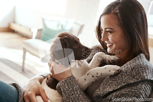 Image of Pet, smile and dog mom in a home on a living room couch with dog bonding with care. Animal love, puppy and person with happiness at home with a smile from animals on lounge sofa together feeling calm