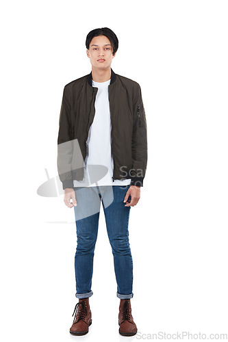 Image of Young man, serious portrait and cool fashion clothes for gen z or edgy millennial standing in white background studio. Male, full body and bored, stern and trendy focus with blank facial expression