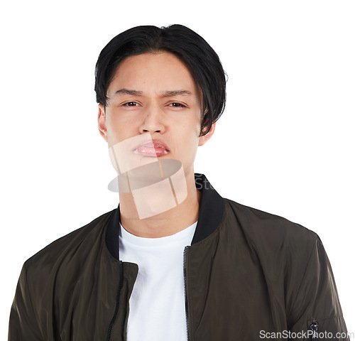 Image of Sad, upset and portrait of an Asian man in studio with an upset, depressed and fear face expression. Frustrated, depression and male model from Asia with unhappy emotion isolated by white background.