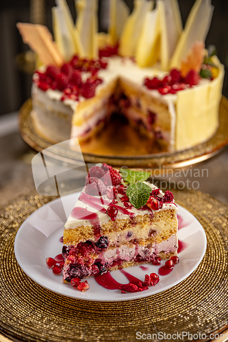 Image of Portion of layered creamy fruit cake