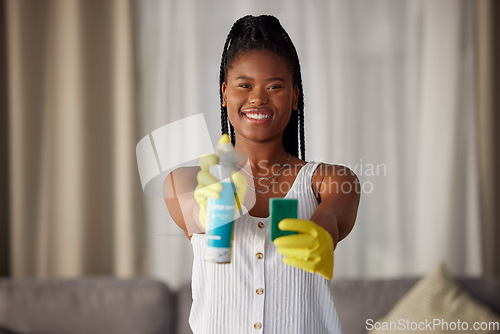 Image of Black woman, portrait and cleaning spray for living room spring cleaning, home maintenance or cleaning service. Young African girl, bacteria products and housekeeper cleaner for apartment safety