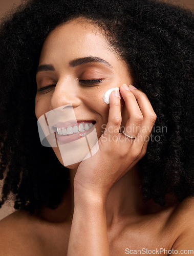 Image of Black woman, skincare and cream for face, makeup and sunscreen product for wellness, luxury beauty and salon cosmetics. Happy model, facial lotion and natural dermatology, aesthetic and healthy glow