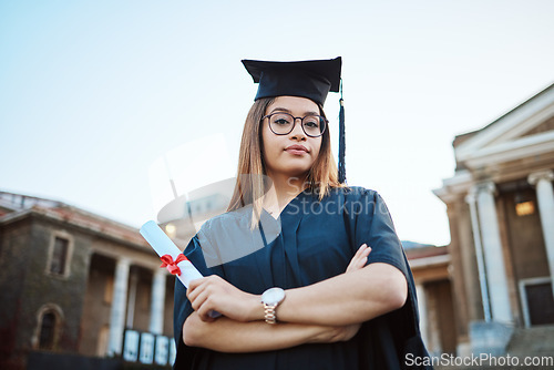 Image of Graduation, education and portrait of woman at university, college and academic campus with diploma certificate. Celebration, graduate ceremony and girl student with success, victory and achievement