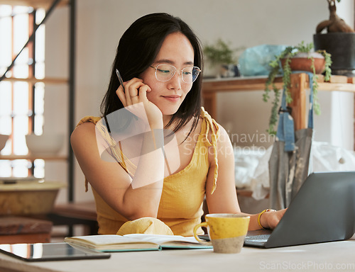Image of Startup, Asian or business woman with laptop thinking, networking or blog content search. Happy, smile or girl with tech for social media, online communication planning or website SEO data review