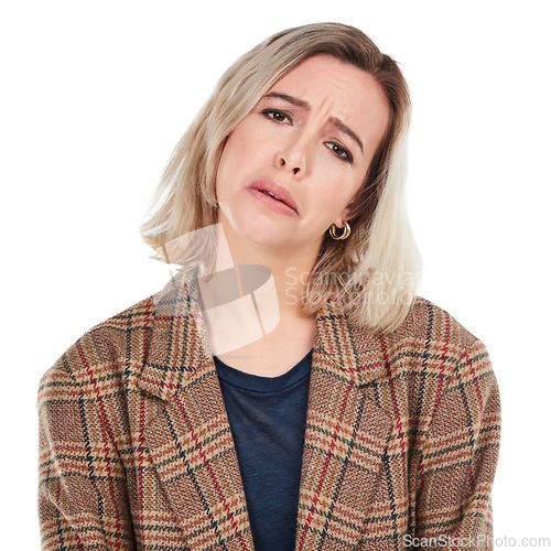 Image of Portrait, sad or white background and a woman isolated in studio with an unhappy or negative expression. Face, sadness and depression with an unhappy young female posing on blank branding space