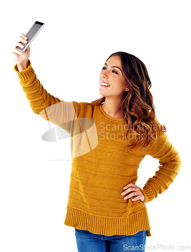 Image of Young woman, selfie and smartphone for happiness, confidence and female person isolated on white studio background. Girl, lady and cellphone for pictures, share on social media and digital connection