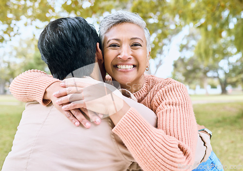 Image of Senior women, retirement or portrait hug in nature park, grass garden and relax environment for support, love or trust. Smile, happy or couple of friends in embrace, bonding or birthday celebration