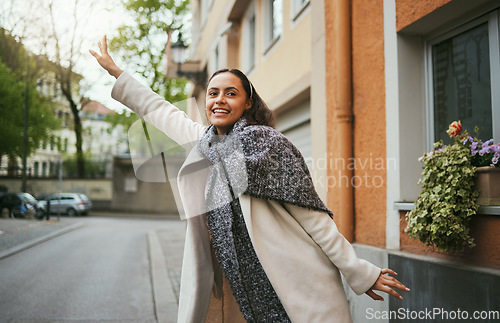 Image of Tourist, travel and hailing taxi in city, street or New York road in transportation, traveling and urban commute. Smile, happy woman and student stopping cab, lift or sightseeing bus in town location