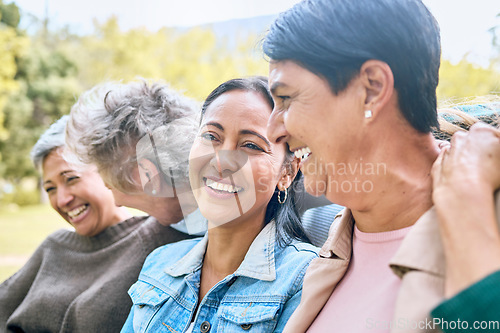 Image of Friends, park and senior women laughing at funny joke, crazy meme or comedy outdoors. Comic, face and happy group of retired females with humor bonding, talking and enjoying time together in nature.
