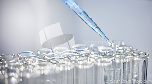 Image of Science, test tubes and syringe for research, experiment or project in chemistry laboratory. Glass vials, innovation and chemical liquid for scientific innovation or analysis in a pharmaceutical lab.