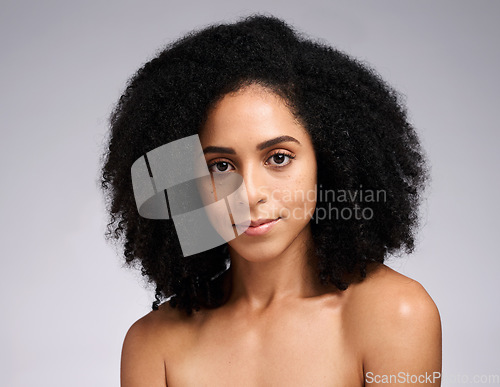 Image of Beauty, natural and portrait of hair care black woman with healthy skincare and afro texture. African hair grooming cosmetics model face with beautiful skin glow in gray studio background.