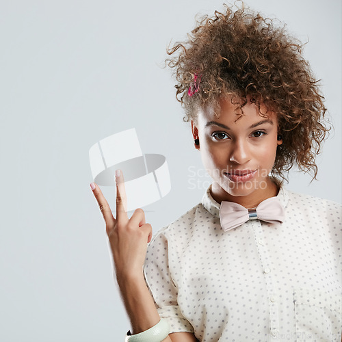 Image of Black woman, peace sign and portrait of a woman smile holding a cool hand sign and mockup. Fashion, white background and isolated model with modern and designer style in a studio with mock up space