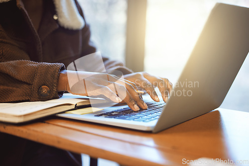 Image of Hands, student and black woman typing on laptop working on assignment project. Learning, education pc and female learner on computer writing email, researching or course planning on table in house.