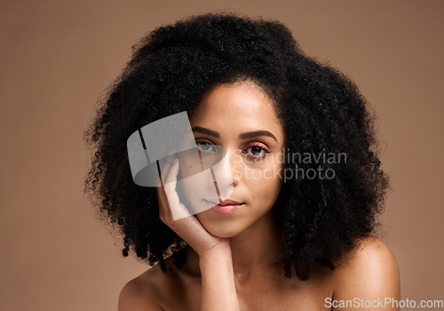 Image of Black woman portrait, beauty and facial skincare with a natural glow and happiness for clean skin on studio background. Face of aesthetic model with afro hair and dermatology, cosmetics and makeup