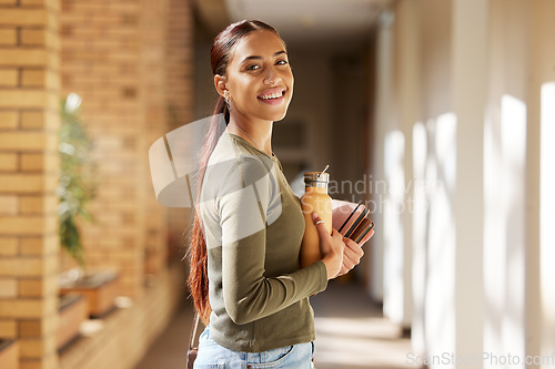 Image of Woman portrait, university student and college books and water bottle while walking at campus with a smile. Gen z female happy about education, learning and future after studying at school building