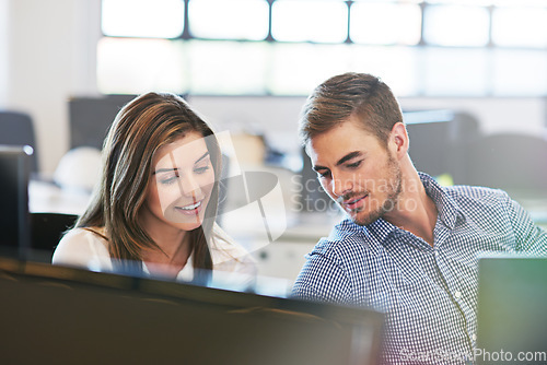 Image of Business people, collaboration and discussion for idea, strategy or conversation together at the office. Man and woman employee workers on computer and sharing ideas for project plan at the workplace