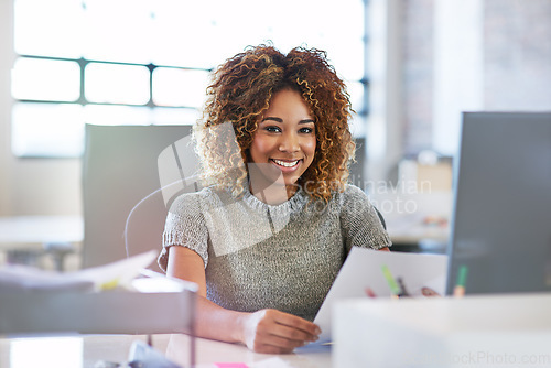 Image of Documents, smile and portrait of black woman with contract for office project or market research at creative startup desk. Happy, paperwork and woman with sales report analysis or performance review.
