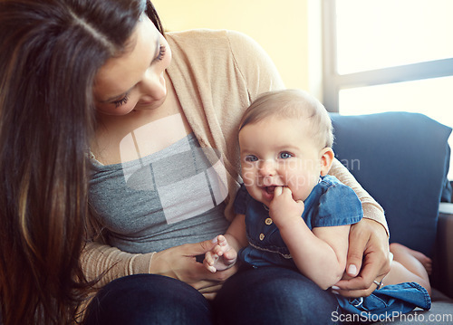 Image of Relax, happy and smile with mother and baby on sofa for bonding, quality time and child development. Growth, support and trust with mom and daughter in family home for health, connection and care