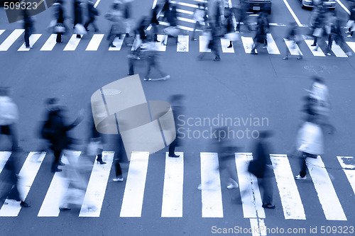 Image of People crossing the street-blue tones