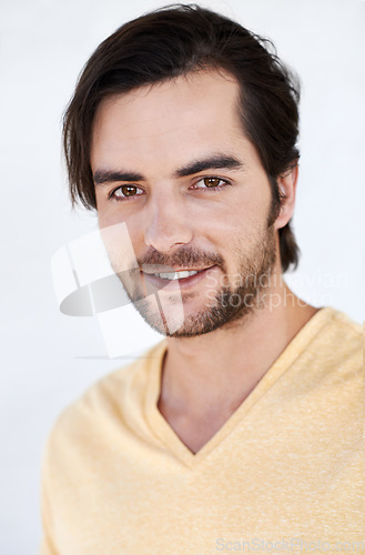 Image of Fashion, smile and portrait of man on a white background with trendy, casual and summer clothes isolated in studio. Stylish, handsome and face of male model with happy attitude, confidence and style