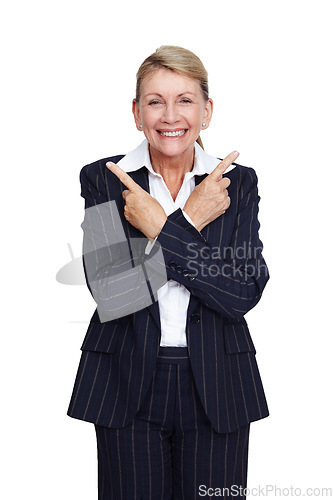 Image of Happy, elderly and portrait of woman pointing fingers isolated on white background in a studio. Direction, showing and smile of a senior business executive with a confident hand gesture on a backdrop