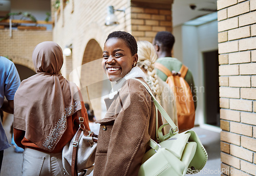 Image of Black woman, happy or portrait on university, school or college campus with friends, people or global study group. Smile, face or diversity students walking to education class or learning buildings