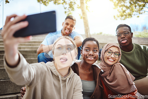 Image of Students, funny faces or phone selfie on university steps, college campus or school bleachers for social media. Smile, happy or diversity friends on mobile photography technology for profile picture