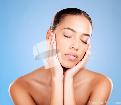 Image of Beauty, face and woman with skincare, cosmetic care and makeup, microblading with wellness against studio background. Hands frame facial, healthy skin and glow with natural cosmetics and treatment