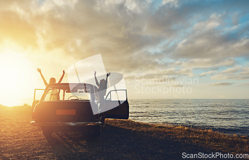 Image of Friends, silhouette and sunset at beach with car, sky and hands in air for freedom, celebration and happy. Summer sunshine, holiday and ocean with vintage suv, travel and women by waves for happiness