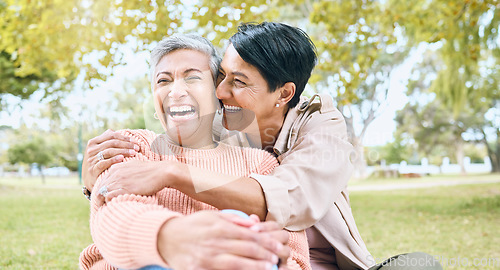 Image of Couple of friends, seniors or laughing hug in nature park, grass garden or relax environment in comic, funny or silly activity. Smile, happy women or bonding retirement elderly in love trust embrace