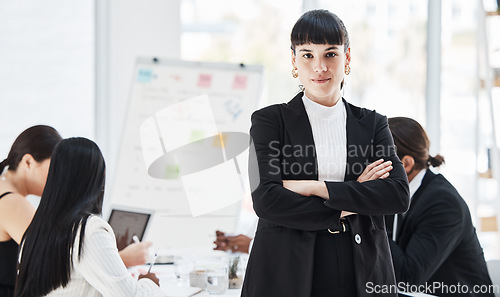 Image of Leader woman, portrait and business people in office, meeting and glasses for leadership vision. Corporate executive, focus and standing by desk for teamwork, collaboration and company success