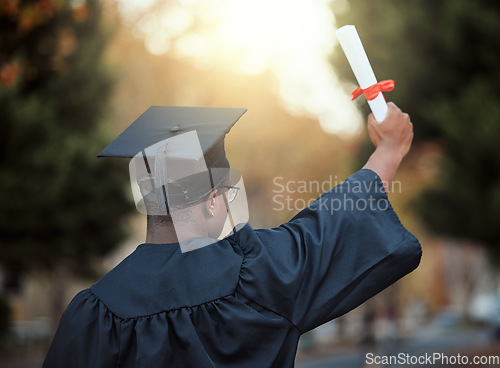 Image of University graduation, certificate and back view of black man with motivation for learning goals, achievement or future. Male graduate student, diploma and celebration of success in college education