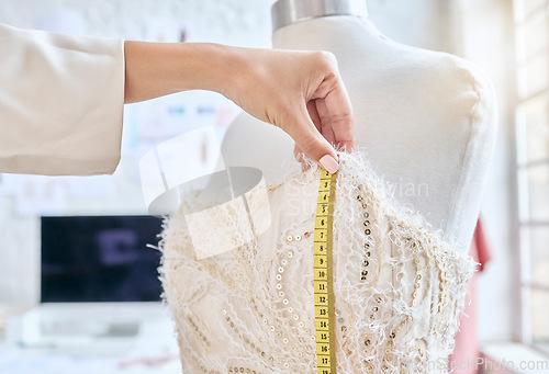 Image of Design, hands and woman designer with measuring tape for dress, pattern and details with fabric in studio. Fashion designer, hand and measurement, creative and luxury, classic and elegant clothing